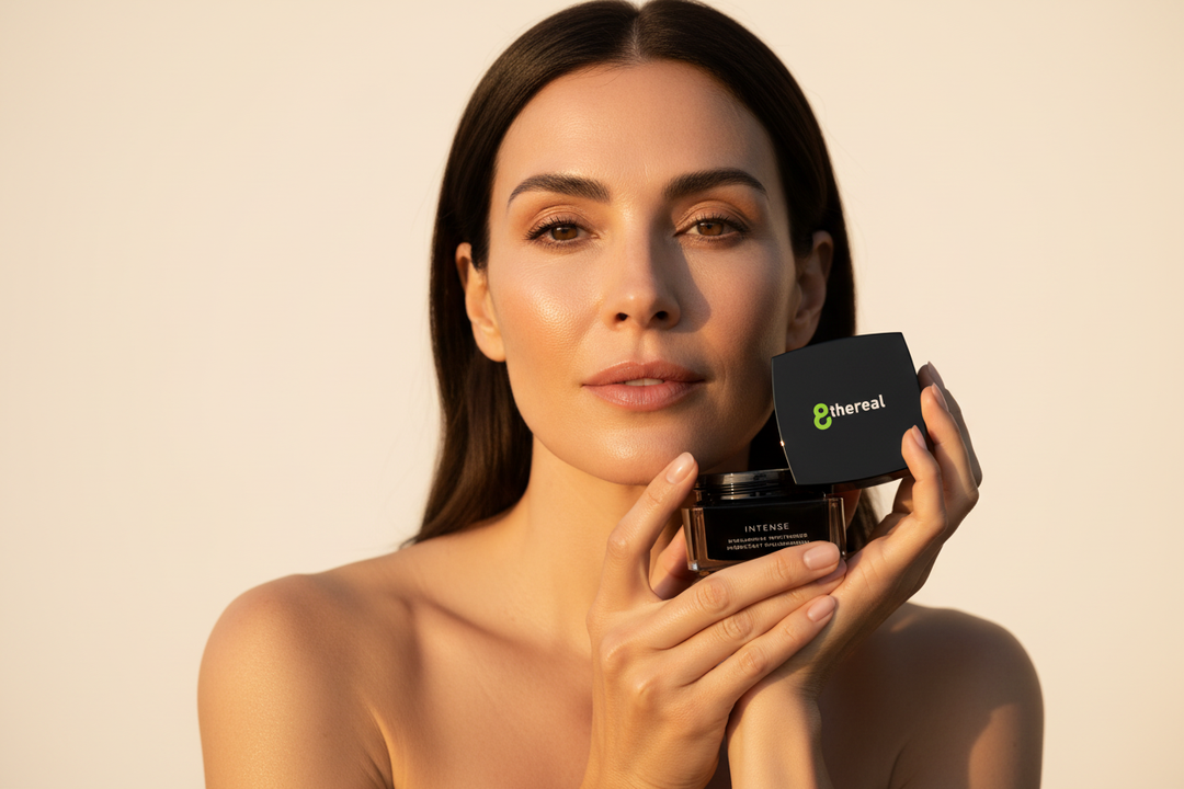 Woman in her 40s with glowing natural skin holding 8thereal Intense Hyaluronic Moisturizer — clean vegan skincare for women over 35