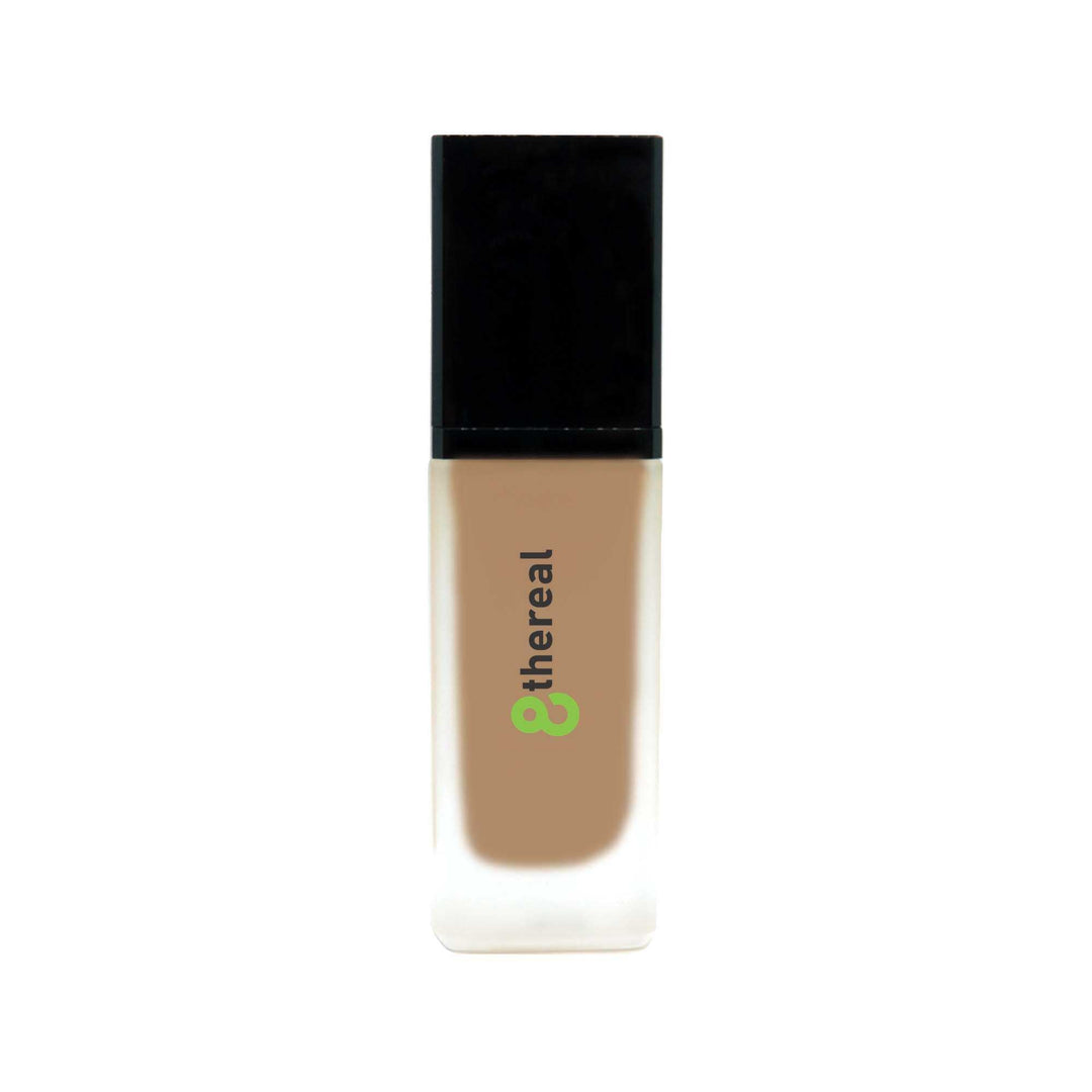 8thereal All-Day Wear Foundation SPF in a sleek glass bottle with a black cap, offering buildable coverage.