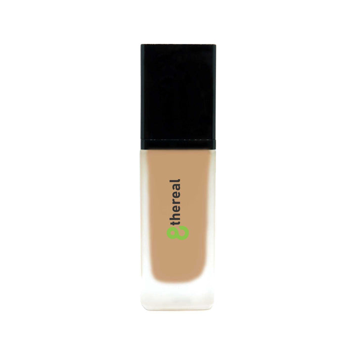 8thereal All-Day Wear Foundation SPF in a sleek glass bottle with a black cap, providing buildable coverage.