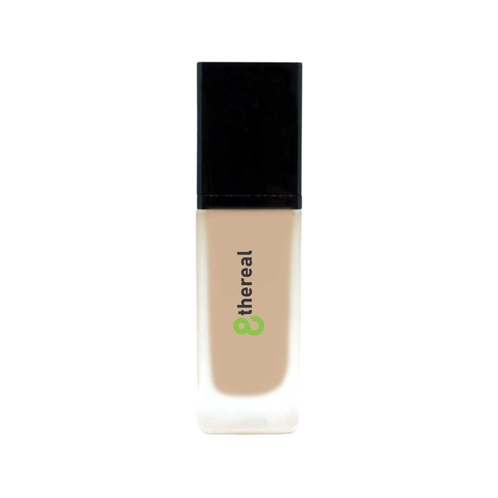 8thereal All-Day Wear Foundation SPF in a sleek glass bottle with a black cap, offering buildable coverage.