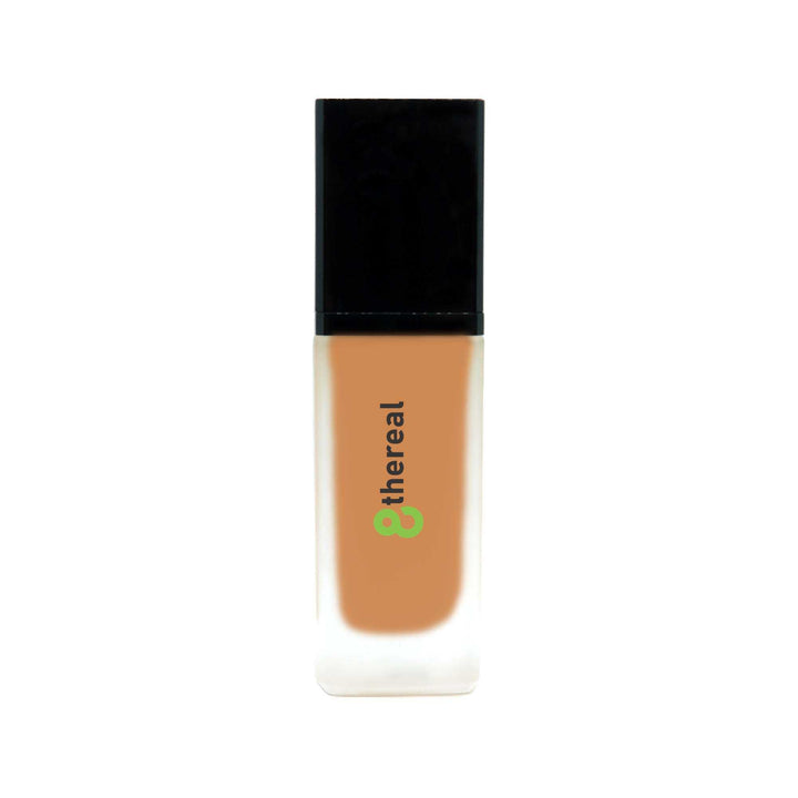 8thereal lightweight foundation with SPF in a frosted glass bottle with a black cap for natural buildable coverage