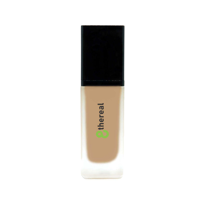 8thereal All-Day Wear Foundation SPF in a sleek glass bottle with a black cap, offering buildable, natural coverage.