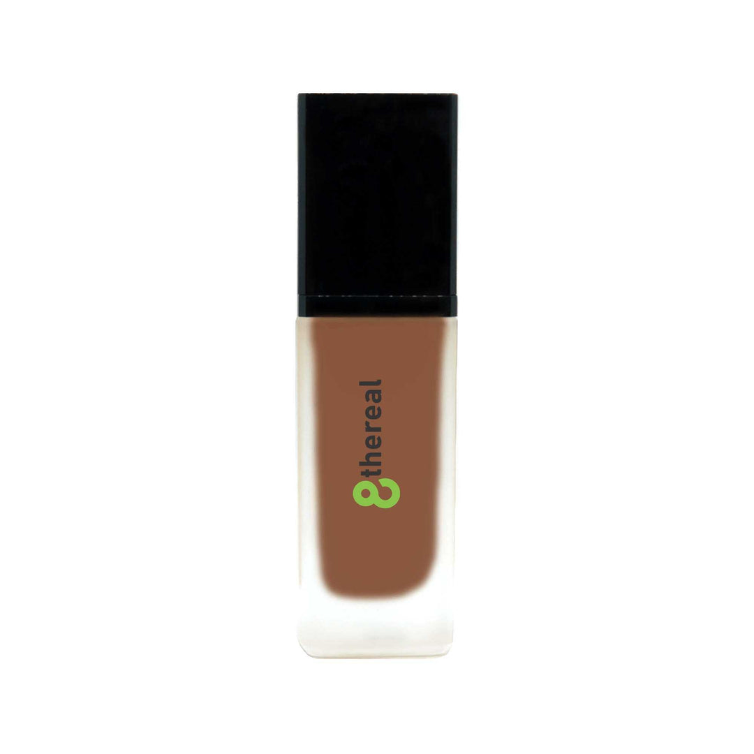 8thereal All-Day Wear Foundation SPF in a sleek glass bottle with a black cap for buildable, natural coverage.