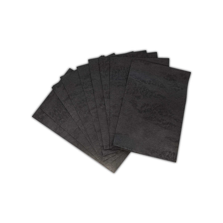 8thereal bamboo charcoal facial blotting papers fanned out to show the thin black oil-absorbing sheets