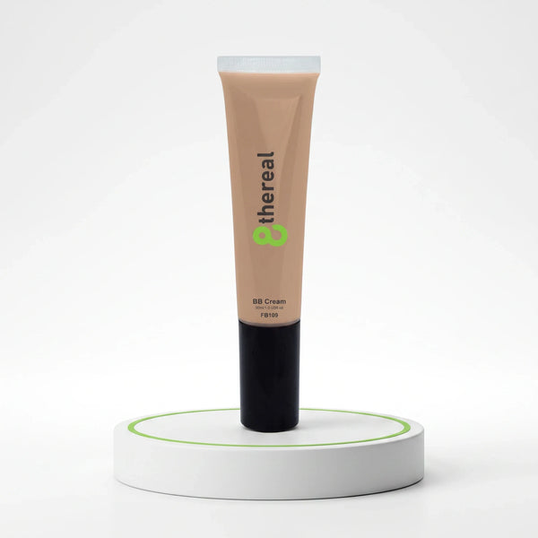 8thereal Everyday Glow BB Cream in a beige tube with a black cap, displayed upright on a white circular pedestal.