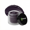 8thereal Deep-Cleansing Glow Mask in a frosted glass jar with a black lid and a smear of dark charcoal cream behind it.