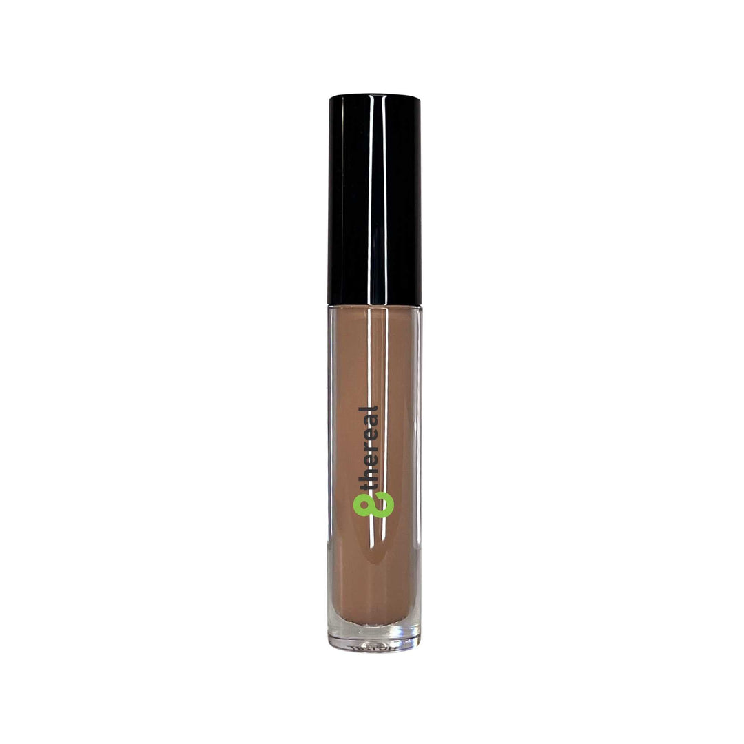 8thereal cream concealer in a clear tube with a black cap and doe-foot applicator for full coverage and brightening.