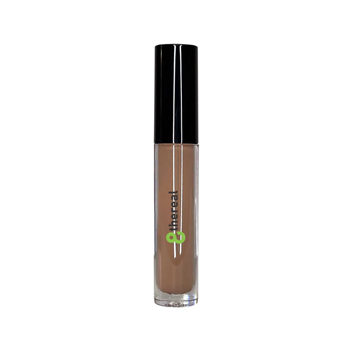8thereal cream concealer in a clear tube with a black cap and doe-foot applicator for full coverage and brightening.