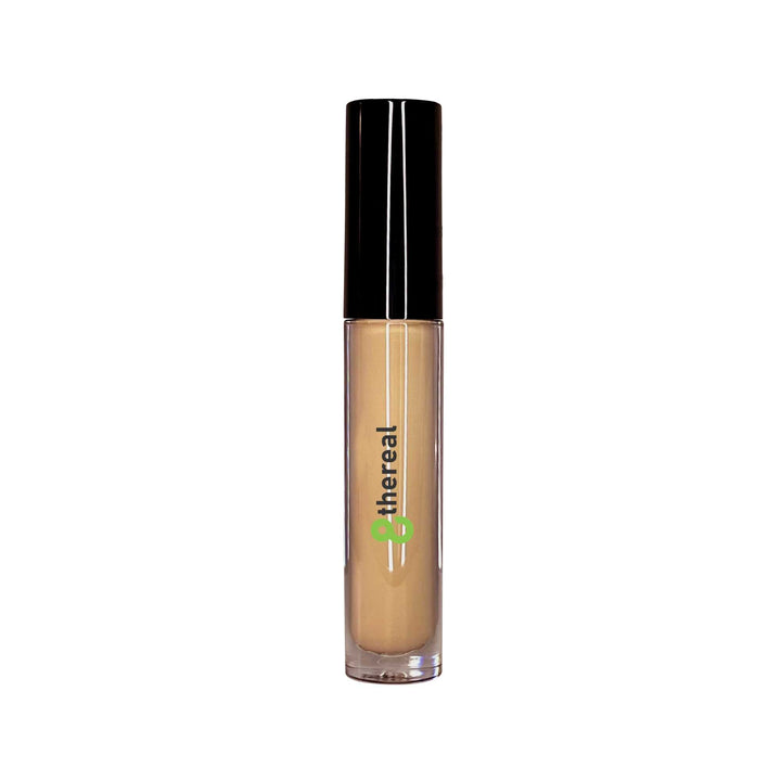 8thereal cream concealer in a clear tube with a black cap and doe-foot applicator for full coverage and brightening.