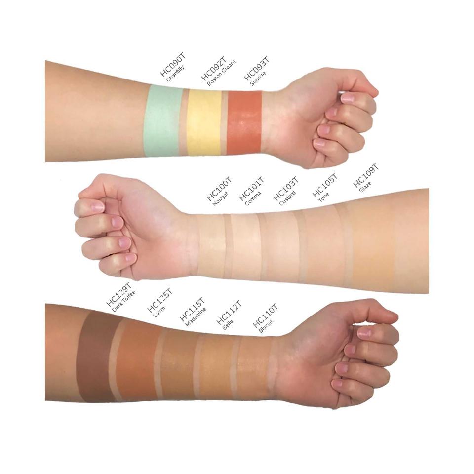 8thereal cream concealer swatches on three arms showing a wide range of skin tone shades from light to deep