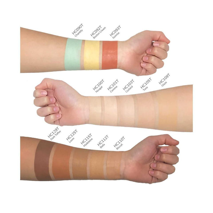 8thereal cream concealer swatches on three arms showing a wide range of skin tone shades from light to deep