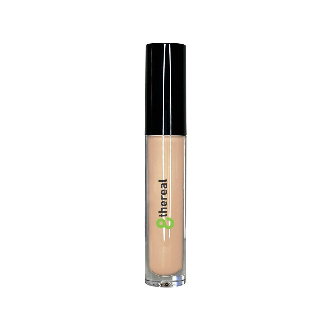 8thereal cream concealer in a clear tube with a black cap and doe-foot applicator for full coverage brightening