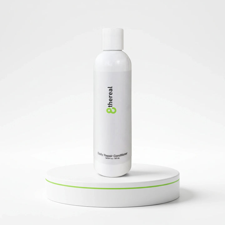 8thereal Daily Strengthening Repair Conditioner in a white 8 fl. oz. bottle on a white pedestal.