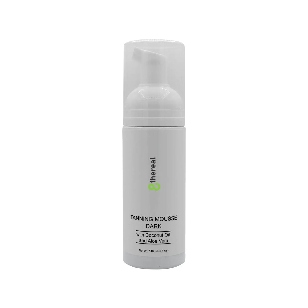 8thereal Tanning Mousse Dark in a white pump bottle with coconut oil and aloe vera for a natural sunless glow.