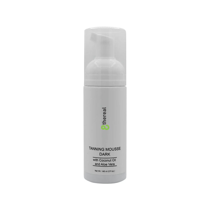 8thereal Tanning Mousse Dark in a white pump bottle with coconut oil and aloe vera for a natural sunless glow.