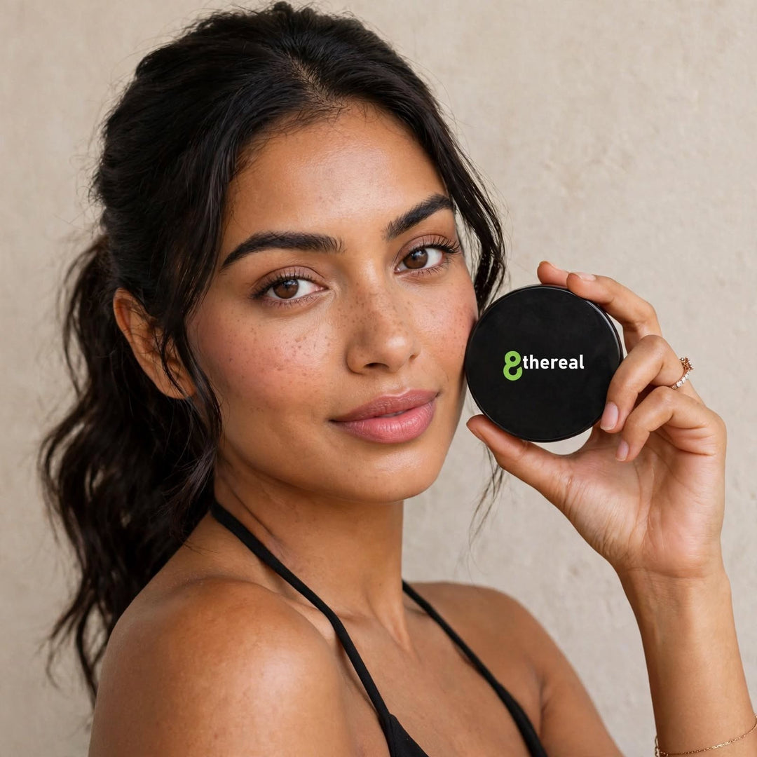 A woman holding an 8thereal Dual Blend Powder Foundation compact, showcasing a natural, soft-focus makeup finish.