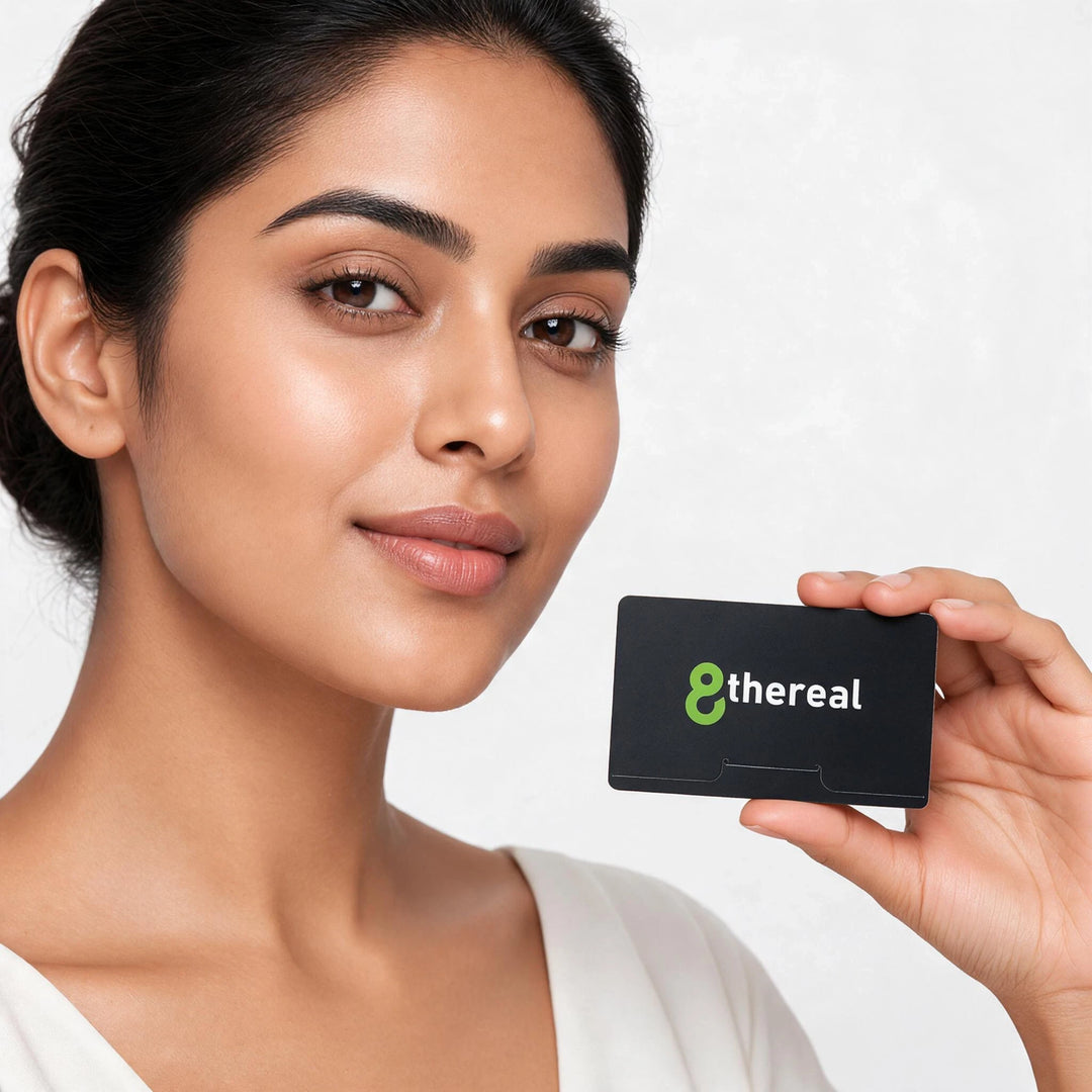 A woman holding a black 8thereal facial blotting paper pack for oil control and a fresh complexion.