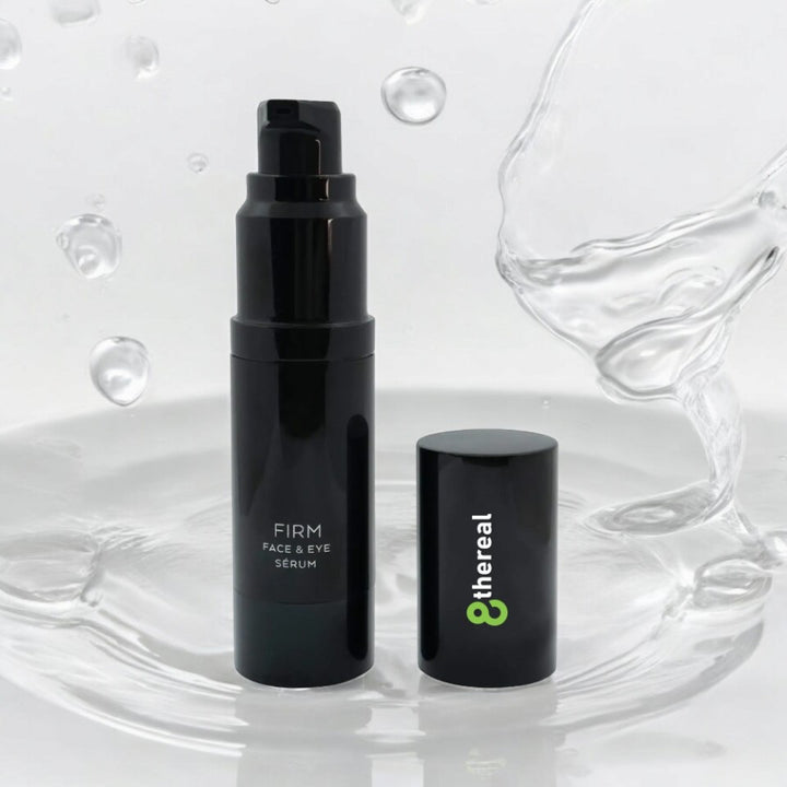 8thereal Firming Face & Eye Comfort Serum in a black pump bottle with cap, surrounded by refreshing water splashes.