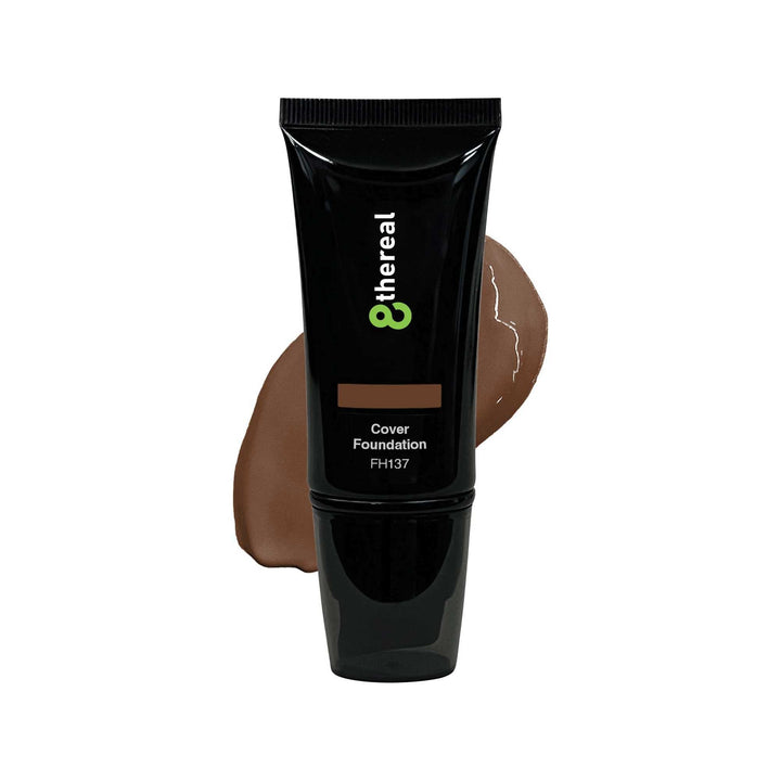 8thereal Skin-First full coverage foundation in a deep brown shade with a creamy texture swatch on a white background.
