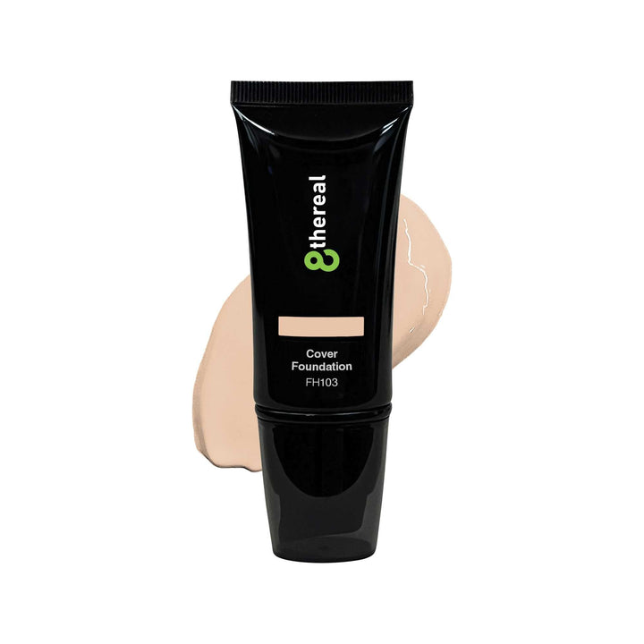 8thereal Skin-First full coverage foundation in a black squeeze tube with a beige liquid swatch behind it.