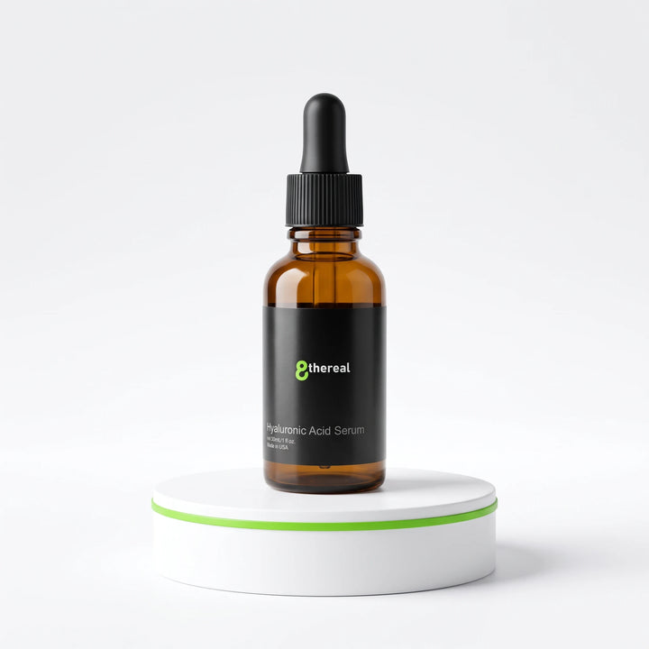 8thereal Luminous Hyaluronic Acid Serum in an amber glass dropper bottle on a white pedestal with a green accent.