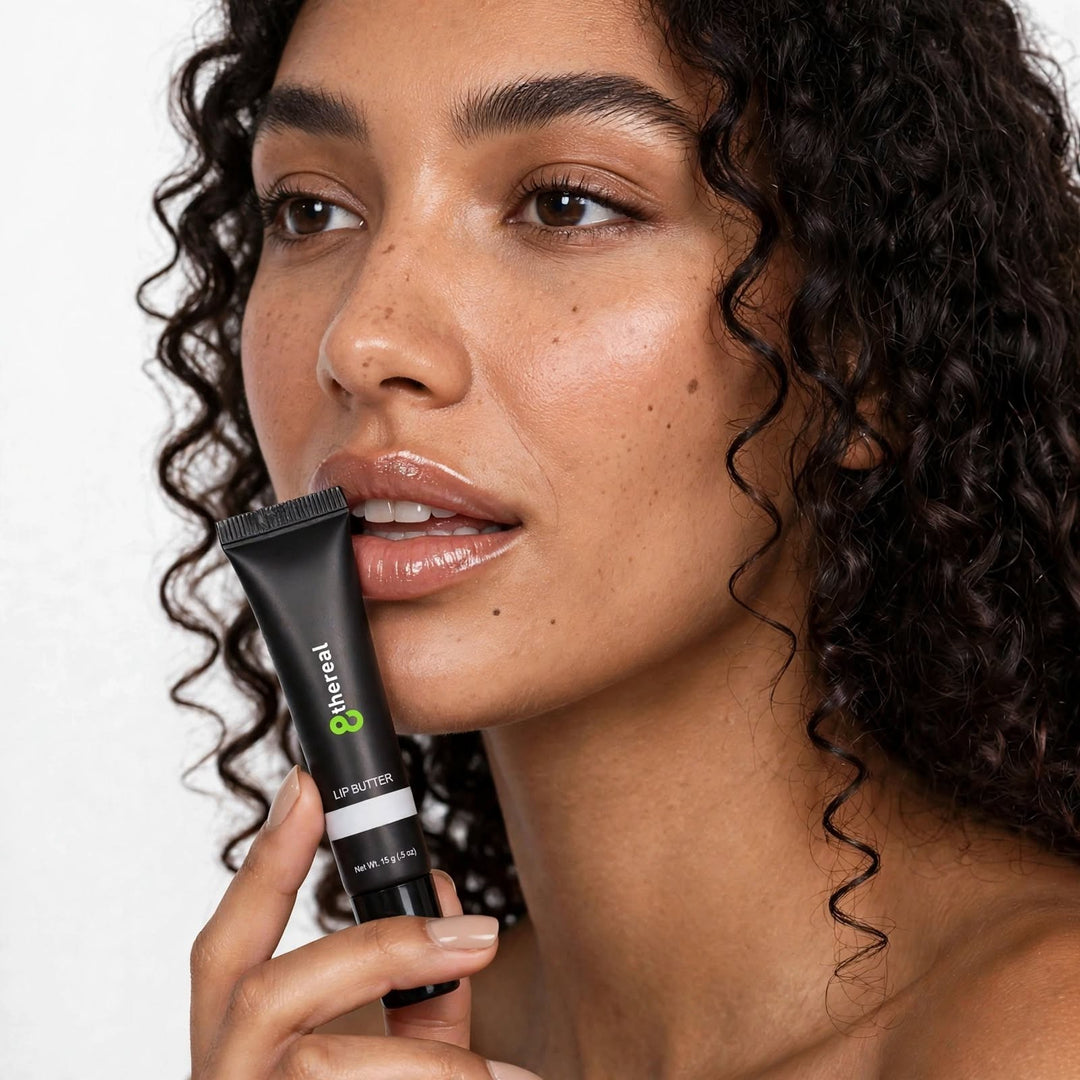 Model applying 8thereal hydrating lip butter for a smooth, glossy finish on healthy-looking lips.