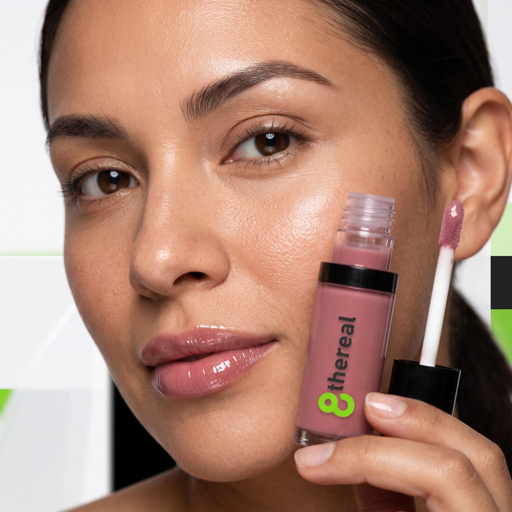 8thereal hydrating lip oil in a mauve shade applied on a model for a glossy, non-sticky, and nourishing finish.