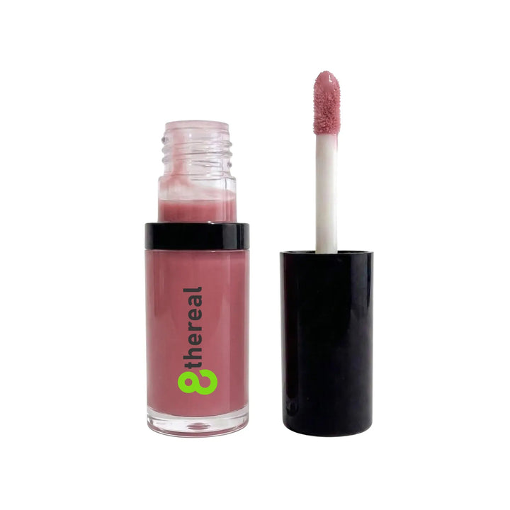 8thereal hydrating lip oil in a soft pink shade with a doe-foot applicator, featuring a glossy, non-sticky finish.