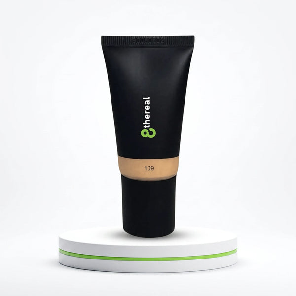 8thereal Hydrating Tinted Moisturizer in shade 109, a lightweight vegan formula in a black squeeze tube on a pedestal.