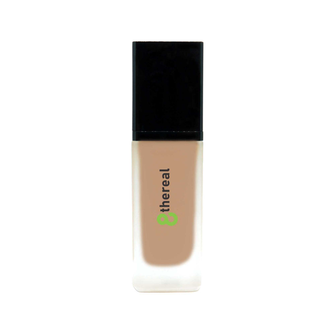 8thereal lightweight foundation in a glass bottle with a black cap, providing buildable coverage and SPF protection.