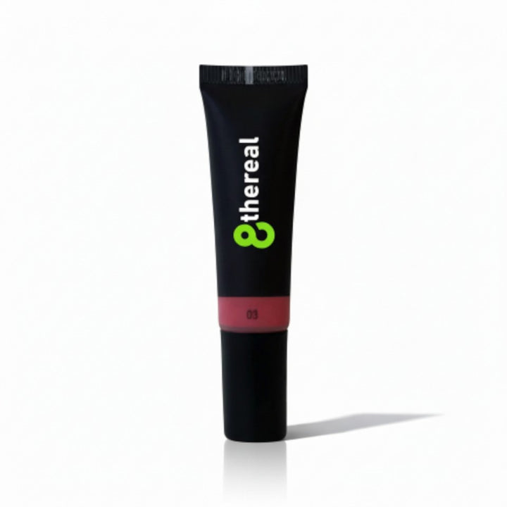 8thereal Soft Flush Liquid Blush in a sleek black squeeze tube with a natural rosy shade for a radiant cheek glow.