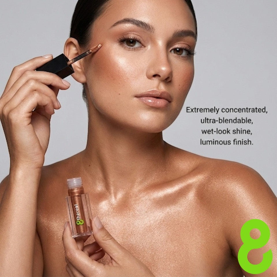 8thereal Liquid Radiance Shimmer applied to model cheekbones and collarbone for a luminous, wet-look bronze glow.