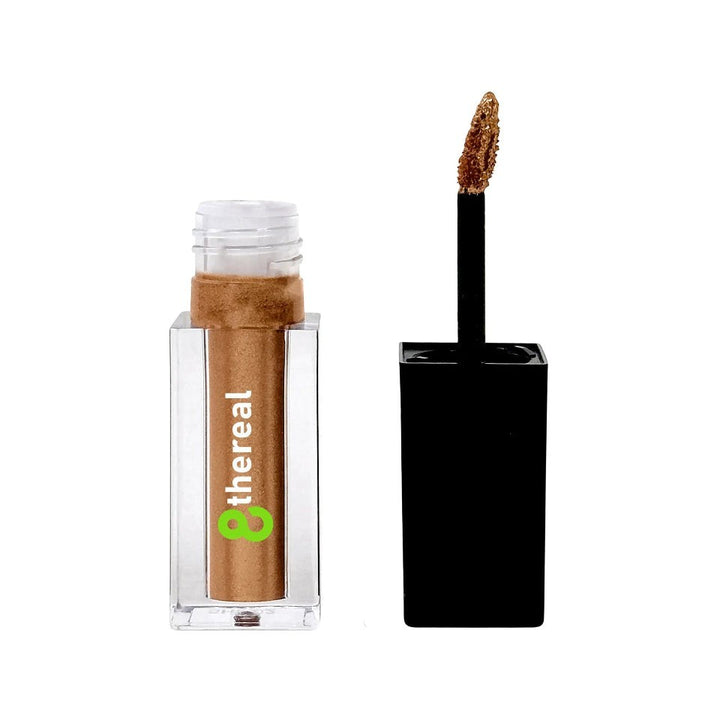 8thereal Liquid Radiance Shimmer in a bronze shade with a doe-foot applicator, featuring a clear bottle and black cap.