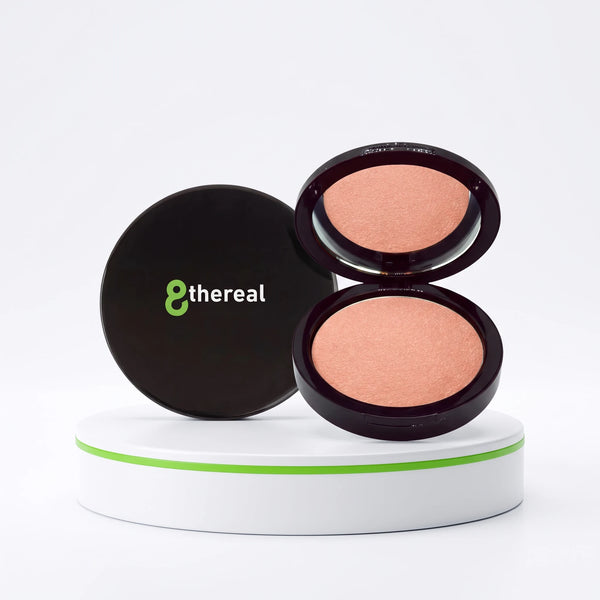 8thereal Soft-Focus Luminizing Powder in a sleek black compact with a mirror, displayed on a white pedestal.