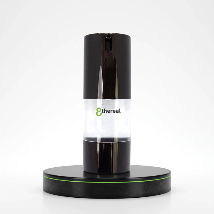 8thereal Oil-Control Matte Face Primer in a sleek black pump bottle on a matching circular display stand.