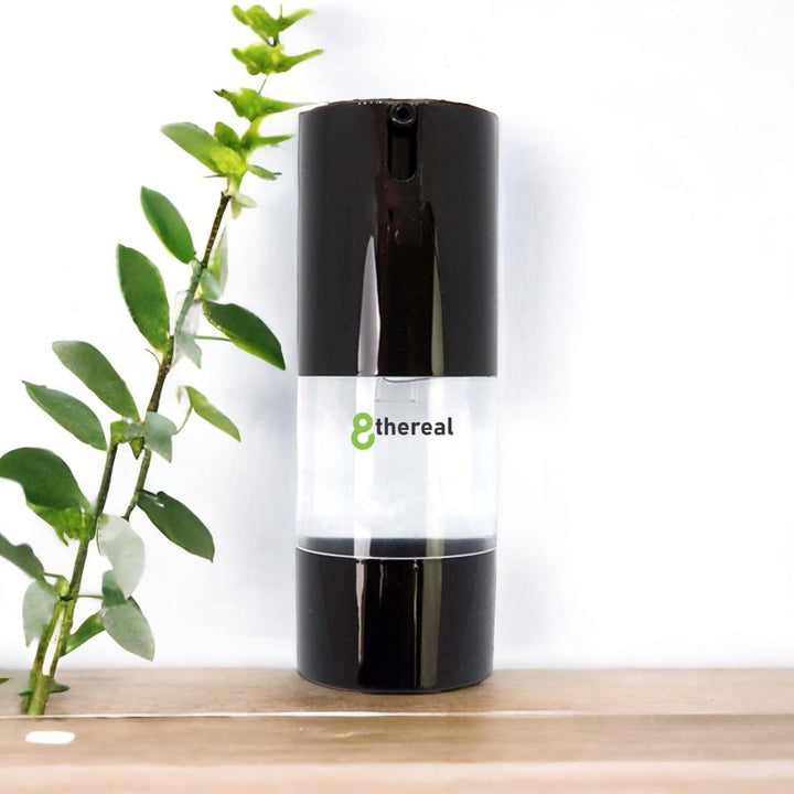 8thereal oil-control matte face primer in a sleek black pump bottle on a wooden surface with a green plant.