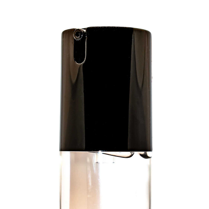8thereal oil-control matte face primer in a clear bottle with a black pump dispenser for pore-blurring application.