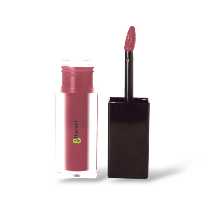 8thereal matte lip stain in a dusty rose shade with a doe-foot applicator, featuring a clear bottle and black cap.