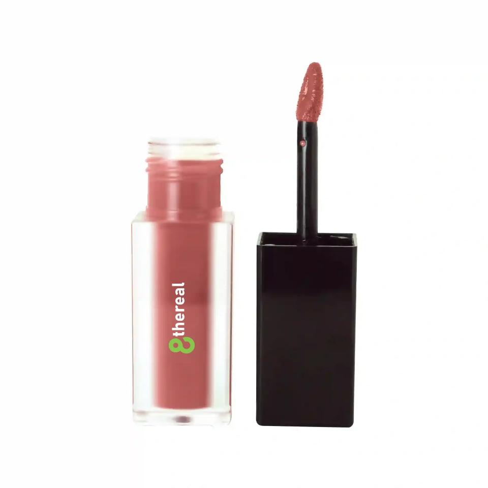8thereal matte lip stain in a dusty rose shade with a doe-foot applicator, featuring a clear bottle and black cap.
