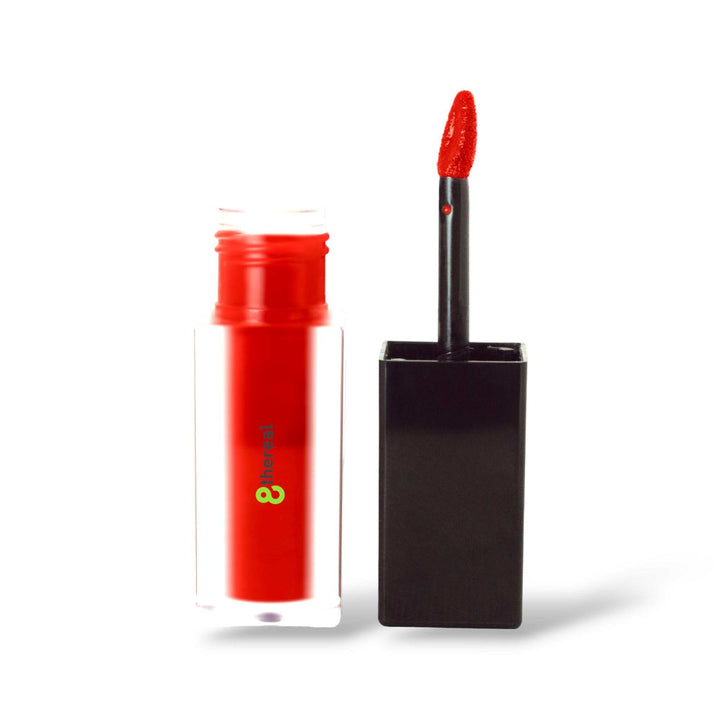 8thereal matte lip stain in a vibrant red shade with a doe-foot applicator and clear glass bottle packaging