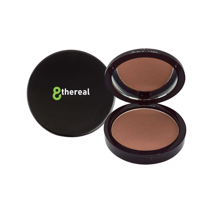 8thereal Natural Warmth Bronzer in a sleek black compact with mirror, featuring a silky, buildable brown powder.
