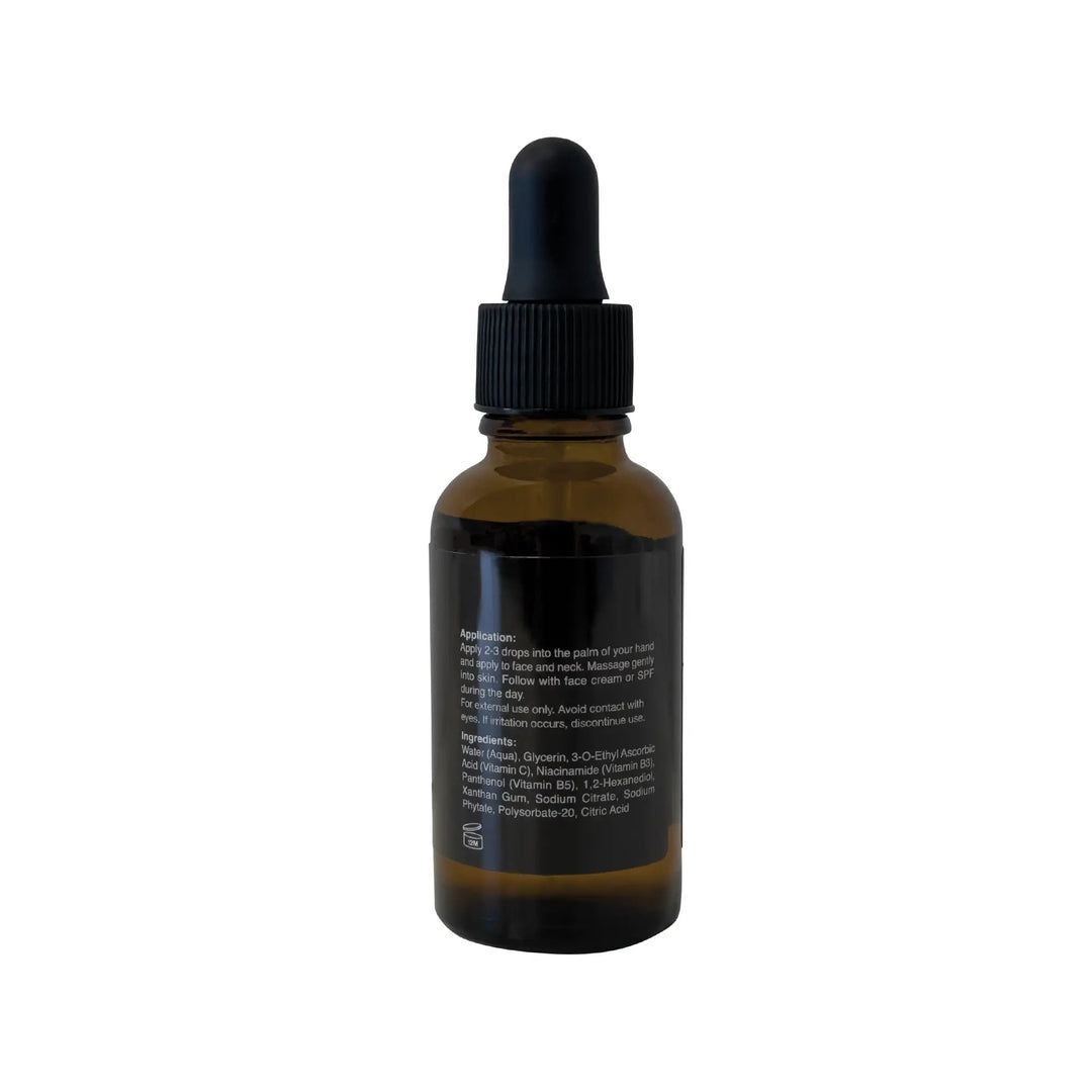 8thereal Brightening Niacinamide Vitamin Boost Serum in an amber glass dropper bottle showing ingredient list