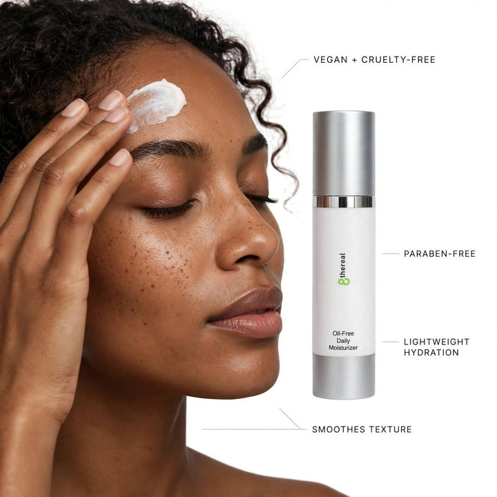 8thereal oil-free daily moisturizer applied to a woman's forehead, highlighting its lightweight, vegan formula.