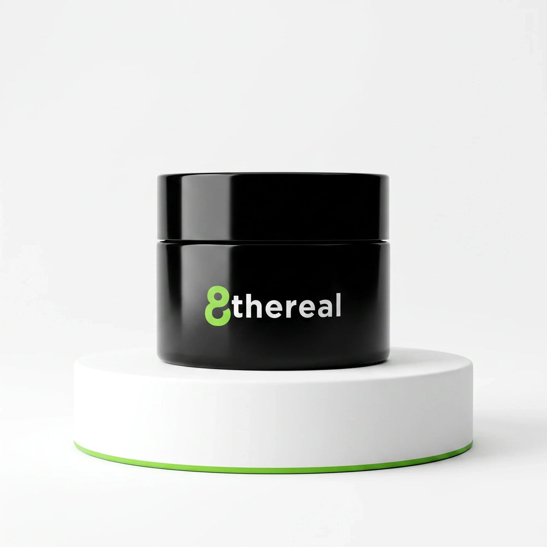 8thereal Smoothing Ageless Eye Cream in a sleek black jar displayed on a white circular pedestal against a white background.