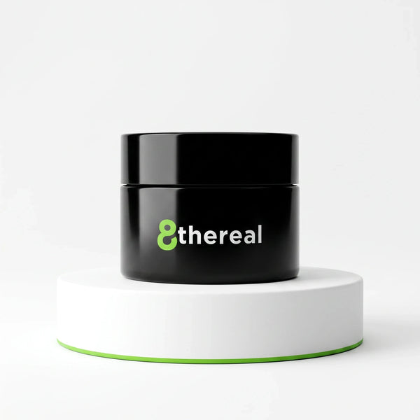 8thereal Smoothing Ageless Eye Cream in a sleek black jar displayed on a white circular pedestal against a white background.