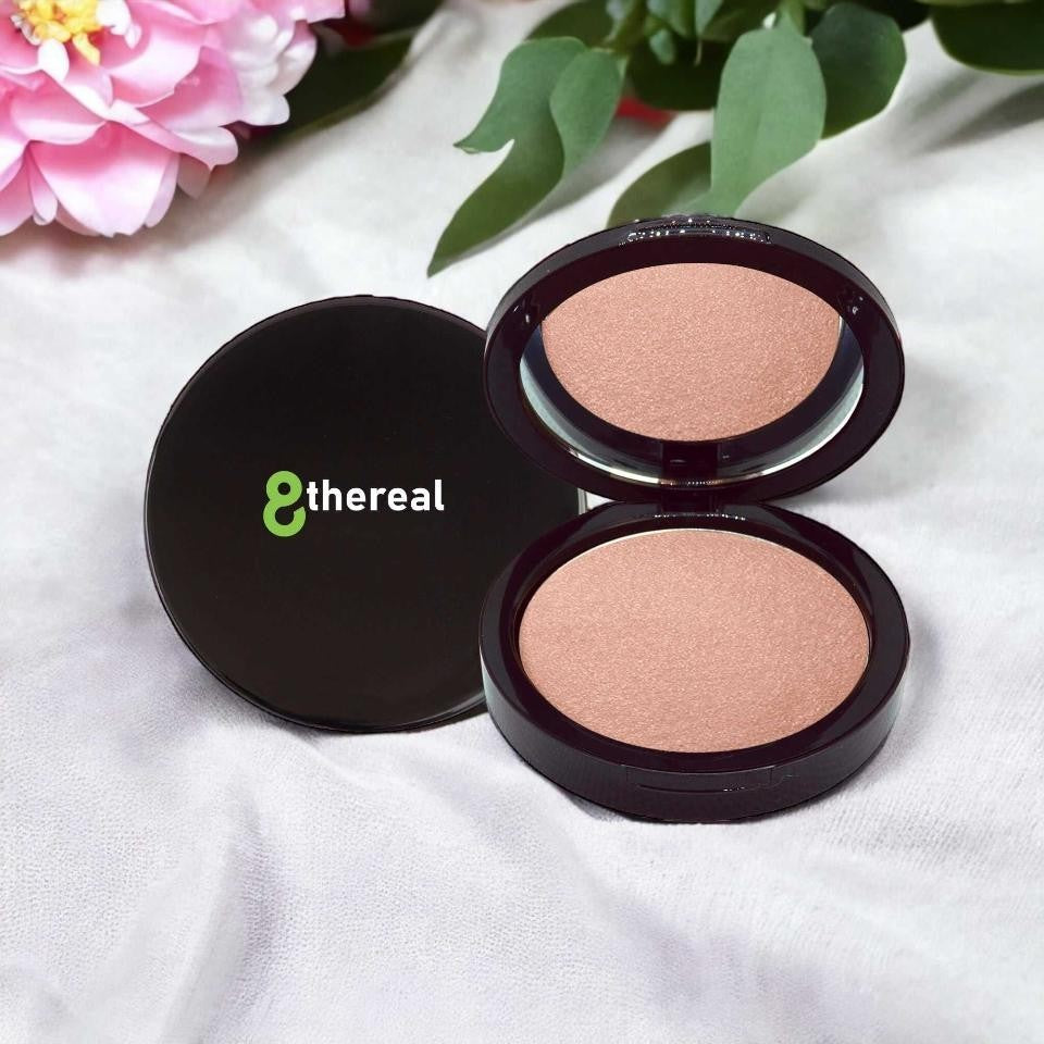 8thereal Soft-Focus Luminizing Powder in a sleek black compact with mirror, featuring a silky, radiant finish.