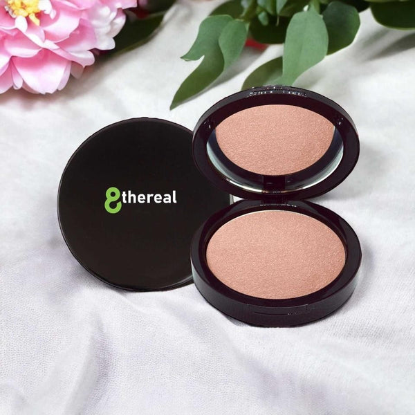 8thereal Soft-Focus Luminizing Powder in a sleek black compact with mirror, featuring a silky, radiant finish.