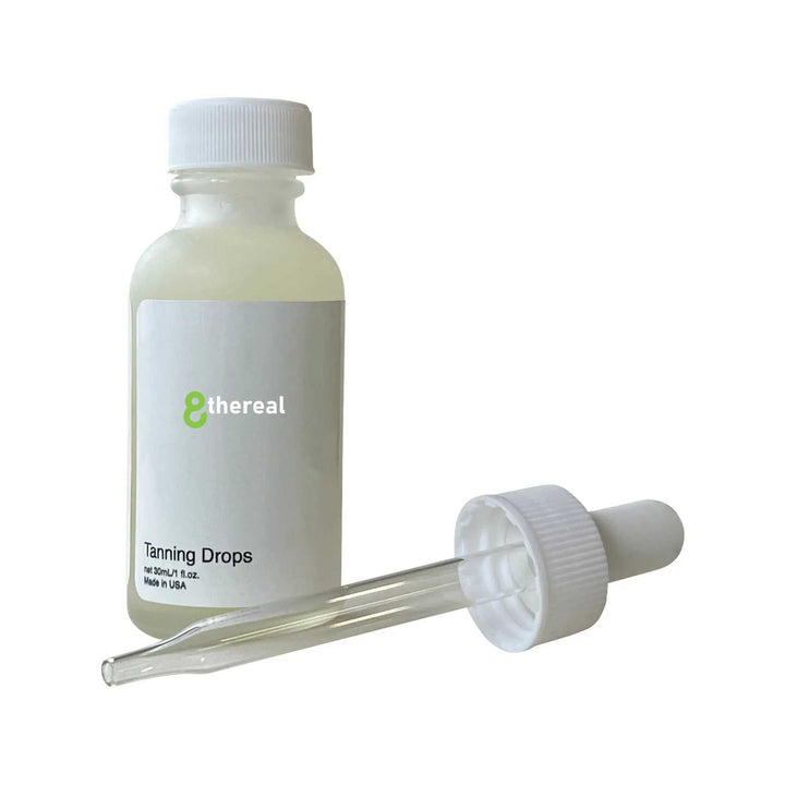 8thereal Sunlit Glow Tanning Drops in a clear glass bottle with a white dropper cap for customizable sunless tanning.