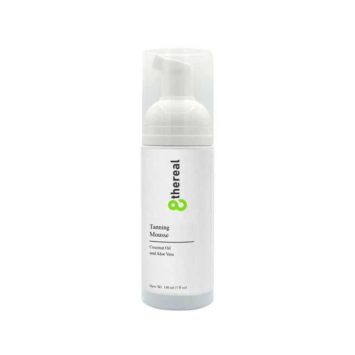 8thereal Tanning Mousse in a white pump bottle, a vegan and cruelty-free sunless tanning foam for a natural bronzed glow.