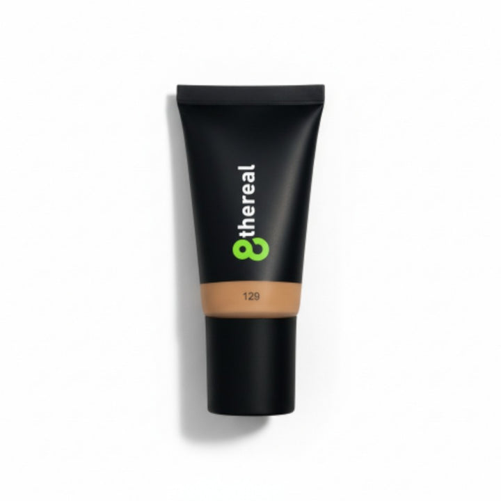 8thereal hydrating tinted moisturizer in shade 129, a lightweight vegan formula in a black squeeze tube.